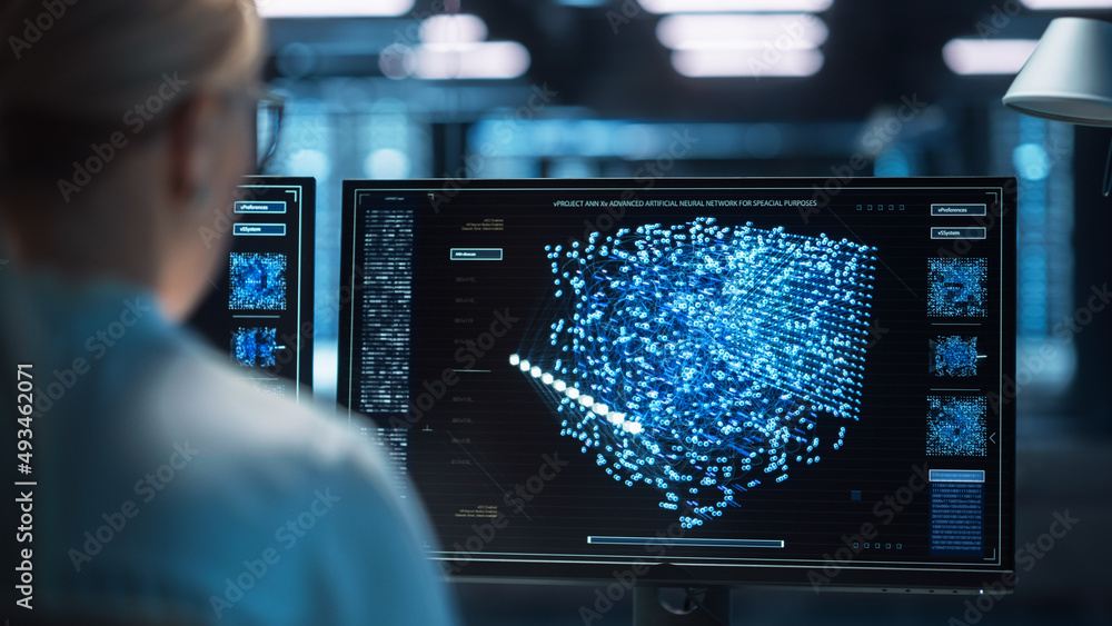 Female Technical Operator Works at Her Workstation with Multiple ...