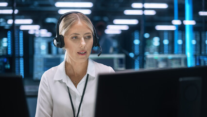 Fototapete - Business Woman Wearing Headset Working in Office to Support Remote Customer. Call Center, Telemarketing, Customer Support Agent Provide Service on Video Conference Call.