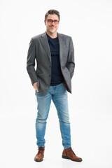 Wall Mural - Middle age businessman in business casual. Entrepreneur in jeans and jacket. Mid adult, mature age man, happy smiling. Full length portrait isolated on white.