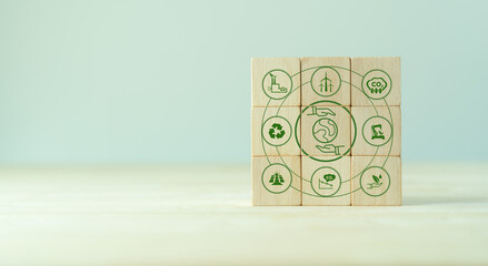 Environmental sustainable concept. Save of earth and environment, net zero emissions and carbon neutral. Wooden cubes with save world and eco friendly icons. World earth day. Eco friendly companies.