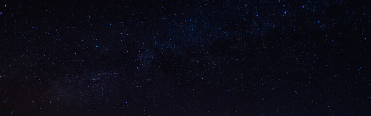 Wall Mural - panorama, blue night sky, milky way and stars on a dark background, universe filled with stars, nebu
