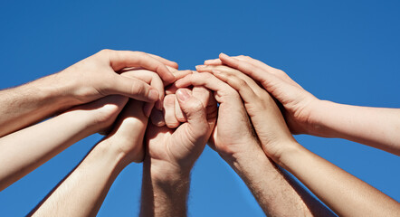 Poster - Supporting each other. Cropped shot of a group of hands holding on to each other.