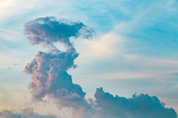 Wall Mural - strange cloud on the blue sky at sunset or evening time.