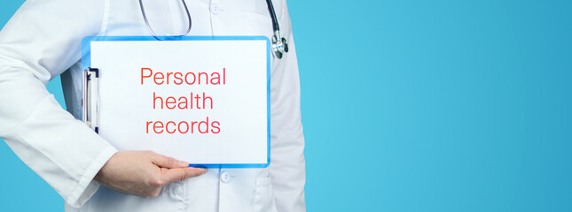 Personal health records (PHR). Doctor with stethoscope holds blue clipboard. Text is written on document.