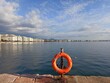  View of the seafront of Thessaloniki, Greece. Port and waterfront of Thessaloniki. Thermaikos Gulf. Lifebuoy on the pier