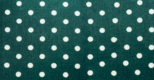 Green Fabric With White Polka Dots Background