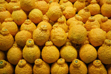 Close Up On Sumo Citrus Orange In Pile