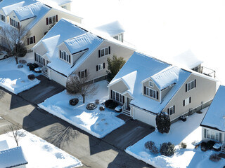 Poster - aerial view of residential house and community in winter after snow