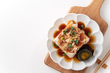 Wall Mural - Delicious Chilled tofu and century egg with soy sauce and bonito flakes.