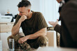 © Drazen - Depressed veteran having meeting with psychotherapist at mental health center.