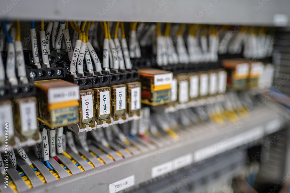 Control panel with circuit breakers, fuses, rails, wiring in the ...