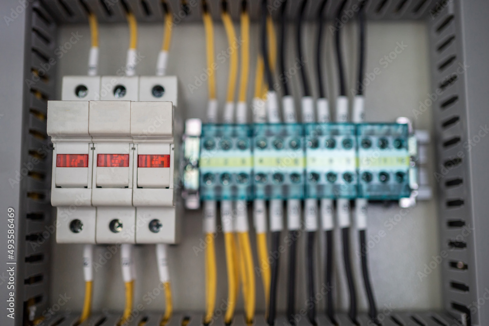Control panel with circuit breakers, fuses, rails, wiring in the ...