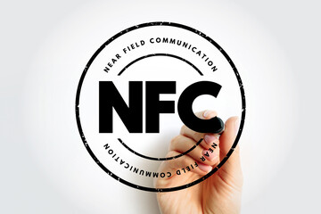 Wall Mural - NFC - Near Field Communication acronym, technology concept background