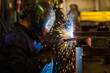 © Максим Халанский - A welder works at a factory
