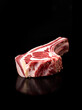 raw prime rib steak isolated black background butcher