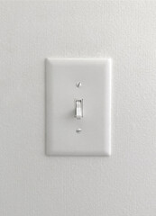 white light switch on painted wallpaper wall