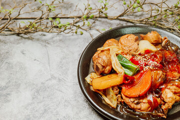Wall Mural - Andongjjimdak, Korean Braised Chicken : To make this dish, chicken is cut into pieces and braised with carrot, potato, and other vegetables, along with a soy sauce-based seasoning. Glass noodles can b