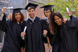 © Marius Venter/peopleimages.com - Ecstatic education success. Shot of excited university students on graduation day.
