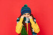 © be free - portrait of child wearing warm clothes. express positive emotion. winter fashion.