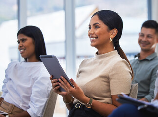 Sticker - A bit of business and laughter. Shot of a young woman using a tablet and laughing during a meeting at work.