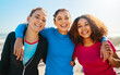 © Delmaine Donson/peopleimages.com - Together we will get trough today. Portrait of a group of young cheerful friends hanging out together before a fitness exercise outside during the day.