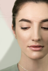 eyebrow correction procedure. brow shaping by thread depilation