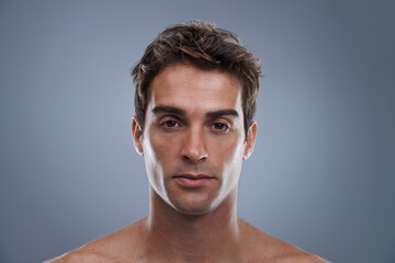 Aufkleber - He has a smoldering smile. Closeup image of a man looking at the camera.