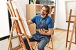 © Krakenimages.com - Middle age caucasian man smiling confident drawing at art studio