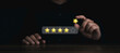 © tete_escape - The last golden star in hand is filling on the rating bar for excellent five stars points, best rating satisfaction by people. Banner for customer service evaluation, client experience survey concept.