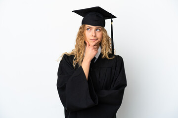 Wall Mural - Young university graduate isolated on white background having doubts