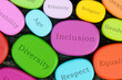 © Fotema - Inclusive words on colorful wooden stones. Diversity in community and work culture concept.