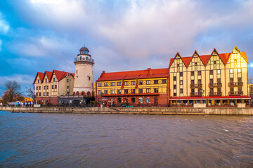 Wall Mural - Fishing village in Kaliningrad. Stylization of ancient Europe, lighthouse, ancient houses.