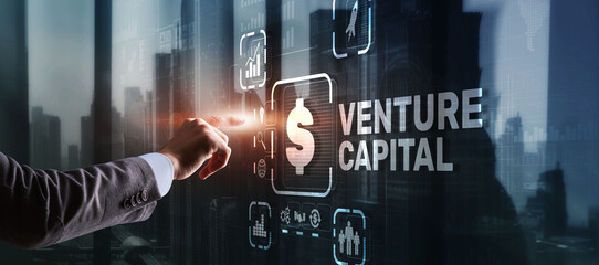 Wall Mural - Venture capital. Investor capital. Businessman pressing virtual screen inscription