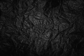 Wall Mural - Black crumpled paper textured background for product overlay or backdrop design