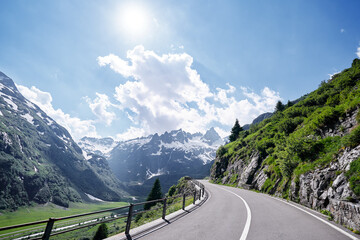 asphalt road in alp mountains. road trip concept. beautiful landscape.