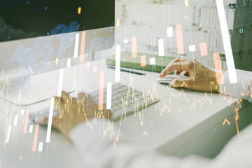 Multi exposure of abstract creative financial graph with world map and hand typing on laptop on background, forex and investment concept