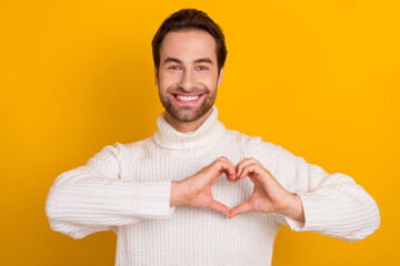 Sticker - Photo of romantic bearded boyfriend guy show heart symbol wear white sweater isolated yellow color background