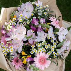 Wall Mural - Beautiful colorful pink, white, pastel, yellow, orange mixed flower bouquet still life in vase.