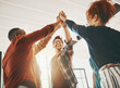 © Arnéll Koegelenberg/peopleimages.com - Collaborate then innovate. Shot of creative employees giving each other a high-five in the office.