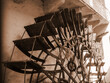 old mill wheel in vintage style