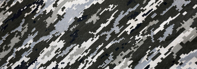 Wall Mural - Fabric with texture of Ukrainian military pixeled camouflage. Cloth with camo pattern in grey, brown and green pixel shapes. Official uniform of Ukrainian soldiers