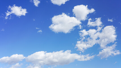 Wall Mural - cumulus clouds and blue sky suitable for background or sky replacement.