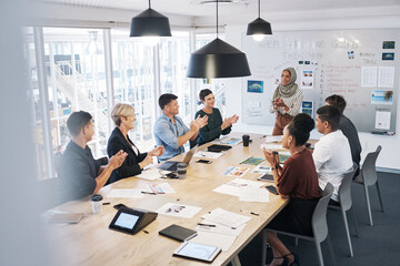 Poster - No one will forget this kind of conference. Shot of a group of businesspeople clapping during a meeting in a modern office.