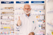 An experienced pharmacist approving medicament.