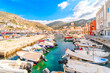 The colorful harbor full with boats at the port and village of Hydra, Greece, one of the Saronic islands in the Saronic gulf off of mainland Greece.	
