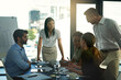 © Katleho S/peopleimages.com - Do we have a problem. Shot of a group of businesspeople meeting in the boardroom.