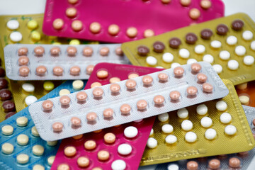 Oral contraceptive pill on pharmacy counter.