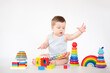 © Irina - Baby Educational Toys, Kid Play Colorful wooden toys on white background Children Education
