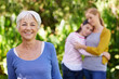 © M S/peopleimages.com - Were a good-looking bunch. Shot of three generations of family women standing outdoors.