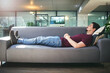 © Allistair/peopleimages.com - The subconscious holds the answers to lifes questions. Shot of a young man lying down on a sofa in a psychologists office.
